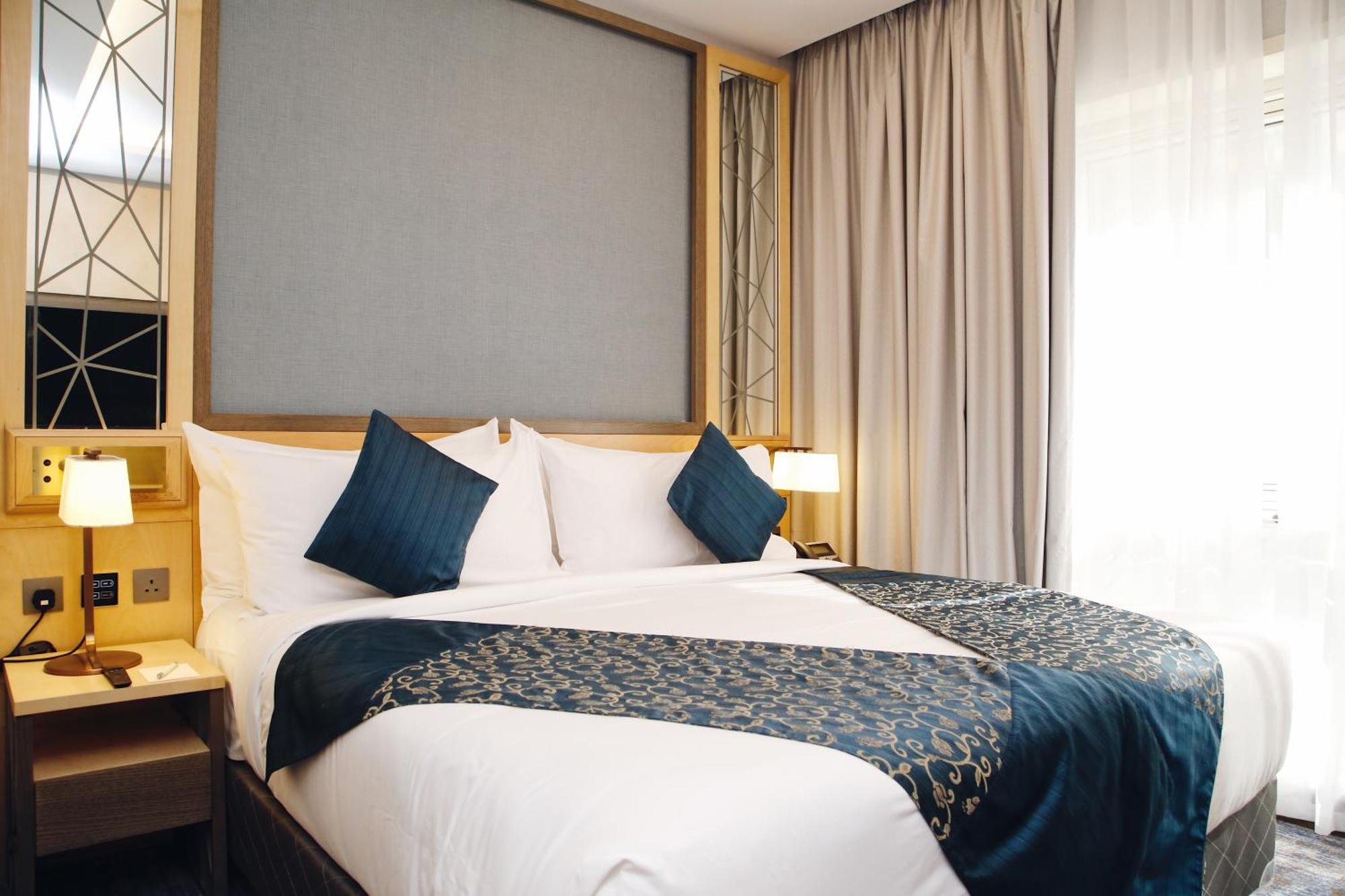 Отель Maden Alrawda Медина Экстерьер фото A bed runner